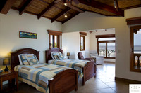Casa_Colorados_Upper_Bedroom_1_CC_Logo