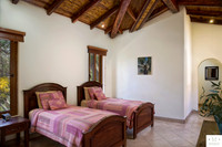 Casa_Colorados_Lower_Bedroom_1_CC_Logo